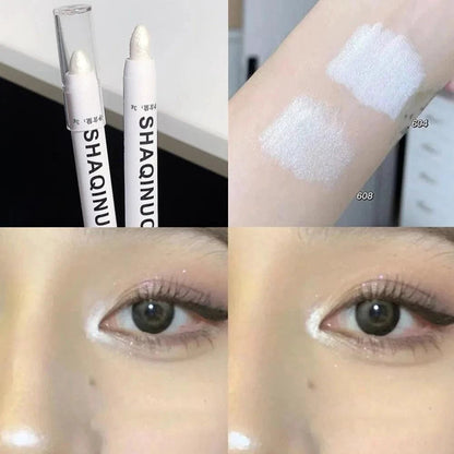 Mandotos matte eyeshadow stick with white eyeliner and shimmer silver highlighter in cream formula, shown in close-up.