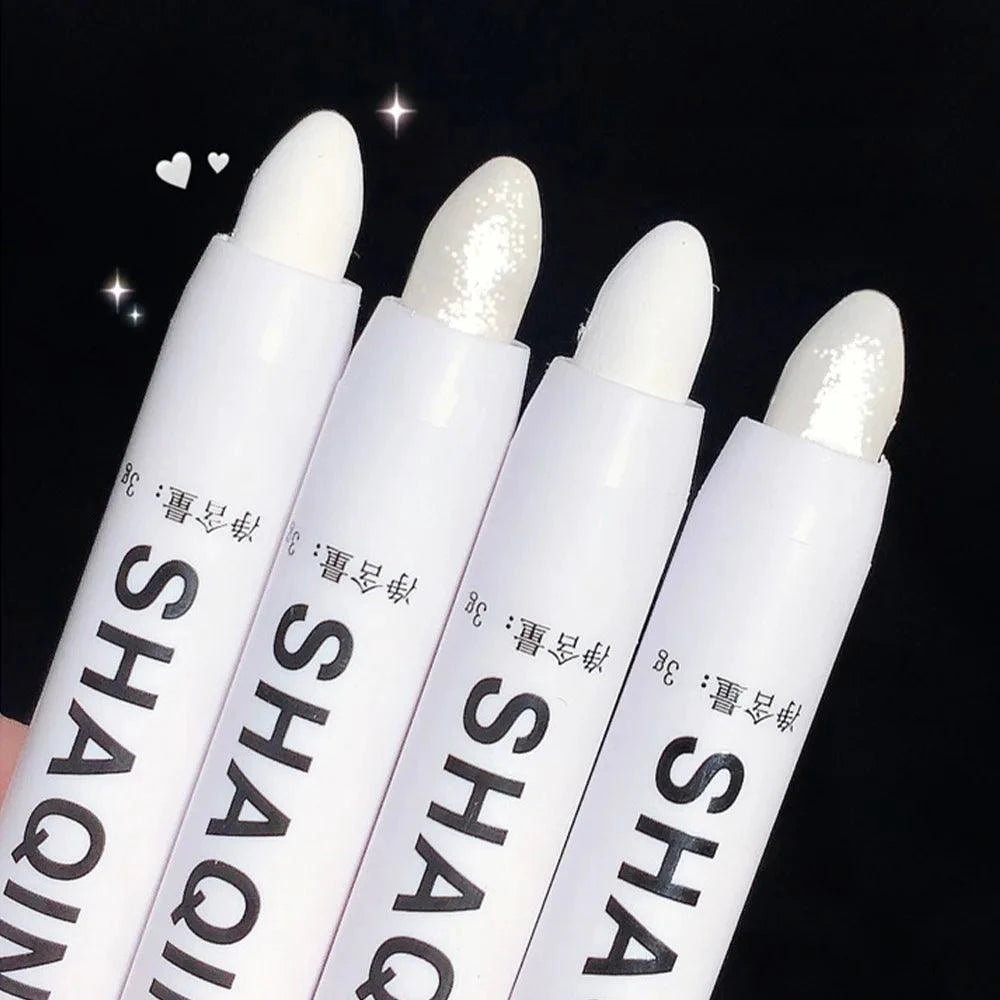 Mandotos matte eyeshadow stick featuring white eyeliner, shimmer silver highlighter pen with a cream formula, suitable for eye makeup.