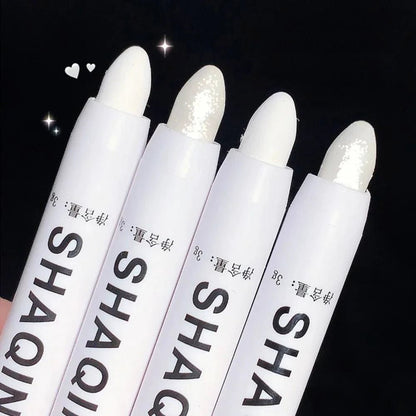 Mandotos matte eyeshadow stick featuring white eyeliner, shimmer silver highlighter pen with a cream formula, suitable for eye makeup.