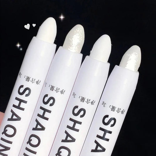 Mandotos matte eyeshadow stick featuring white eyeliner, shimmer silver highlighter pen with a cream formula, suitable for eye makeup.