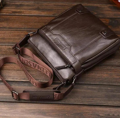 Men's messenger bag by MANDOTOS featuring durable fabric, adjustable strap, and multiple compartments for everyday use.