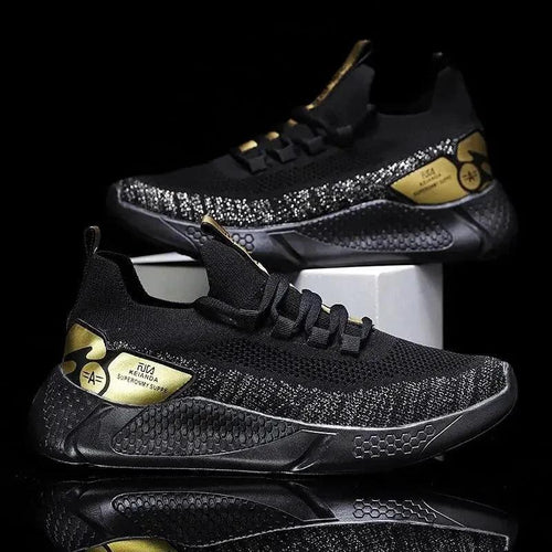 Mandotos men's athletic trainer shoes with black and white design, breathable mesh upper, and cushioned sole for active sports.