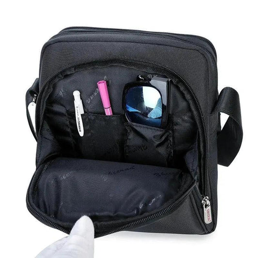 Mandotos men's Oxford cloth shoulder bag with multiple compartments, stylish messenger and business bag for everyday use.