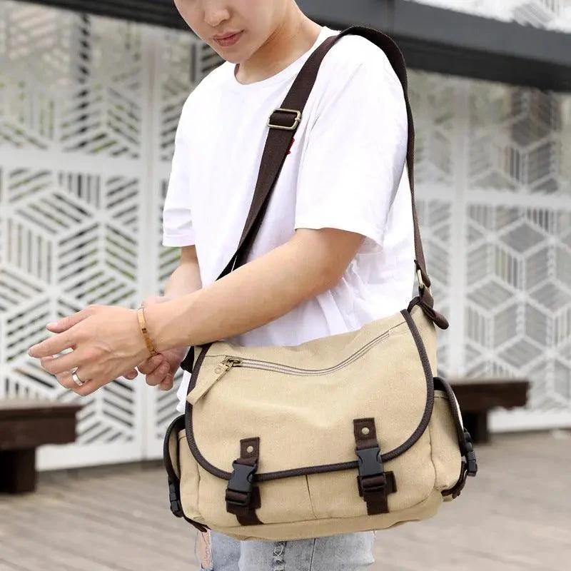 Men's canvas shoulder bag by Mandotos, multifunctional messenger bag with adjustable strap and multiple compartments.