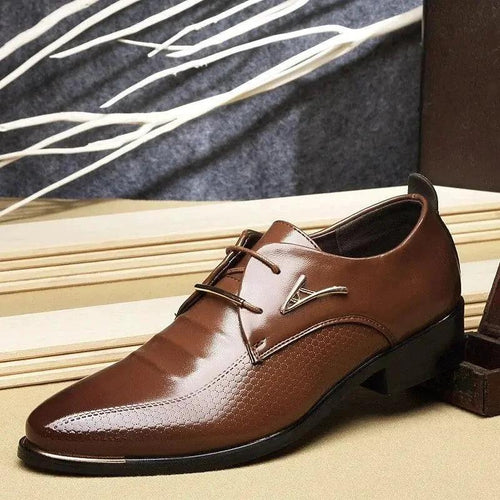 Men's casual leather shoes by MANDOTOS, featuring a sleek design with brown leather and stylish laces.