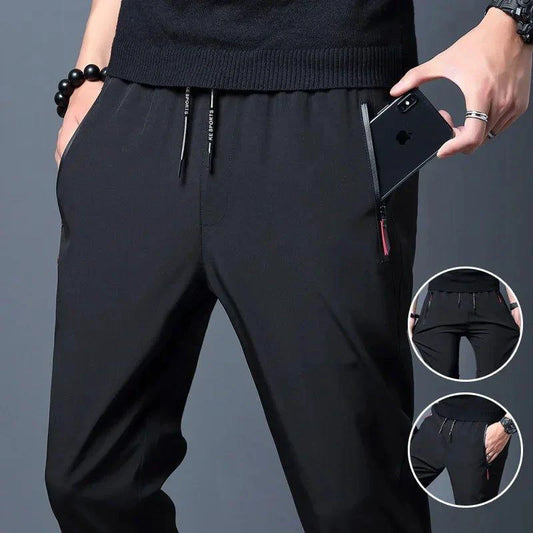 Mandotos men's casual slim fit jogger pants with elastic waist in blue, black, and gray, featuring a classic Korean style.