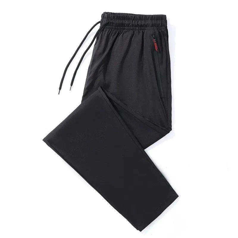 Mandotos men's casual slim fit jogger pants in blue, black, and gray with elastic waist, classic Korean style, plus size available.