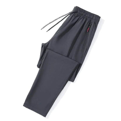 Mandotos men's casual slim fit jogger pants with elastic waist in blue, black, and gray, featuring a classic Korean style.
