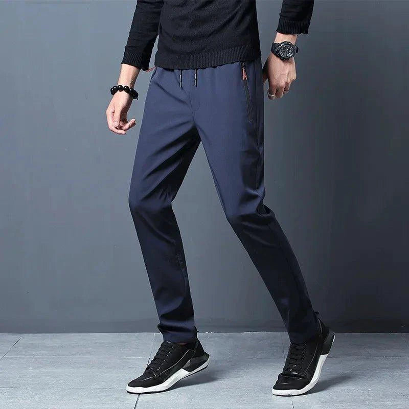 Mandotos men's casual slim fit jogger pants with elastic waist in blue, black, and gray, designed for a comfortable, stylish fit.