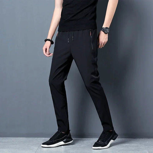Men's casual slim fit jogger pants in blue, black, or gray with elastic waist, Korean style, plus size, by MANDOTOS.