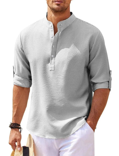 Men's casual long sleeve shirt with stand collar and solid color, from MANDOTOS, displayed on a neutral background.