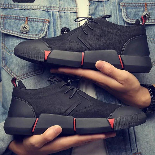 Men's chic leather sneakers by MANDOTOS featuring stylish design and comfortable fit, shown in black with white soles.