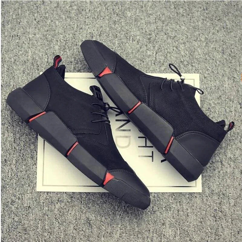Men's chic leather sneakers by MANDOTOS, featuring stylish design, comfortable fit, and sleek black leather uppers.
