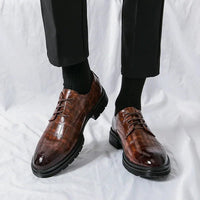 Men's elegant breathable tassel loafers by MANDOTOS, featuring sleek design and comfortable leather material.