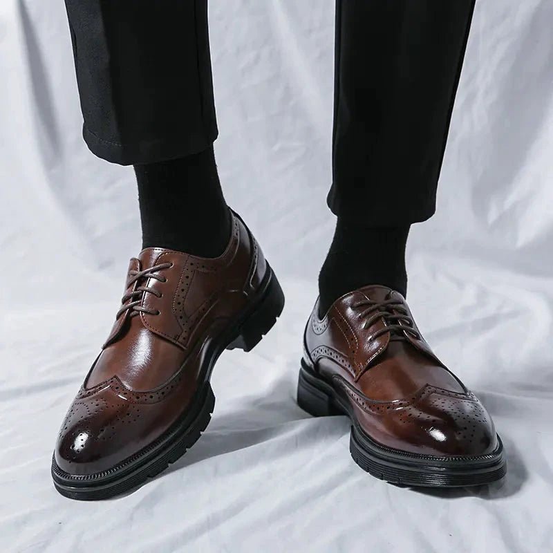 Men's breathable tassel loafers by MANDOTOS, featuring elegant design and comfortable fit, shown in a stylish close-up.