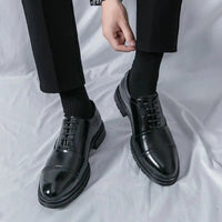 Men's elegant breathable tassel loafers by MANDOTOS, featuring smooth leather and stylish tassel details.