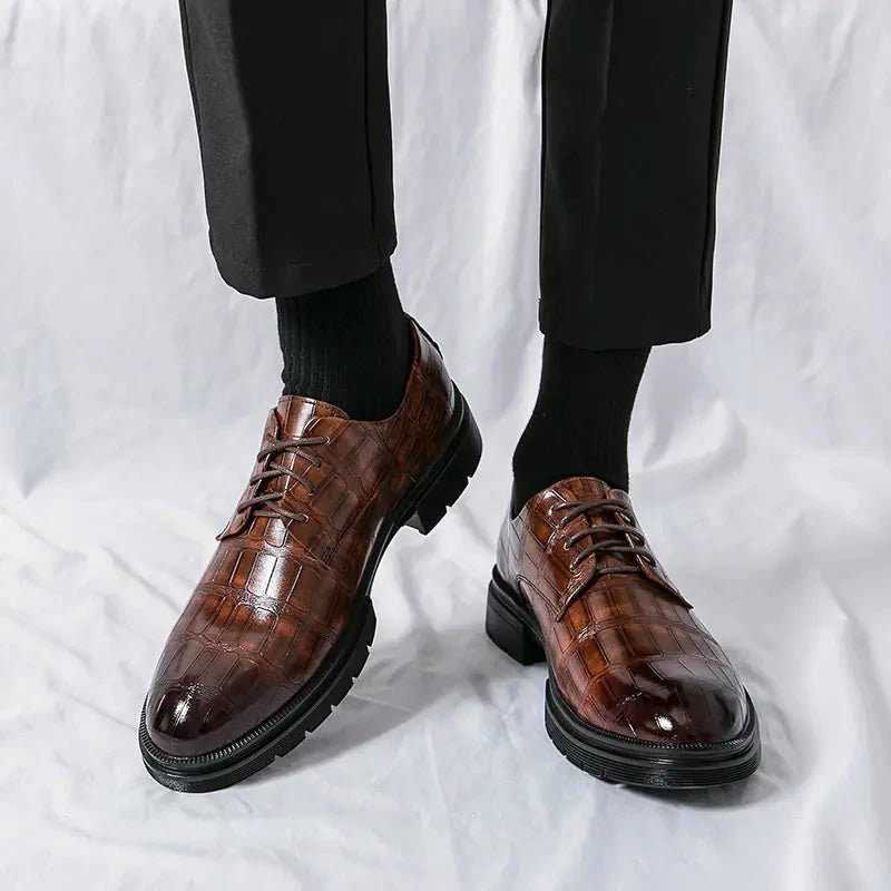 Men's elegant breathable tassel loafers by MANDOTOS, featuring sleek design and comfortable fit, shown in a stylish close-up image.