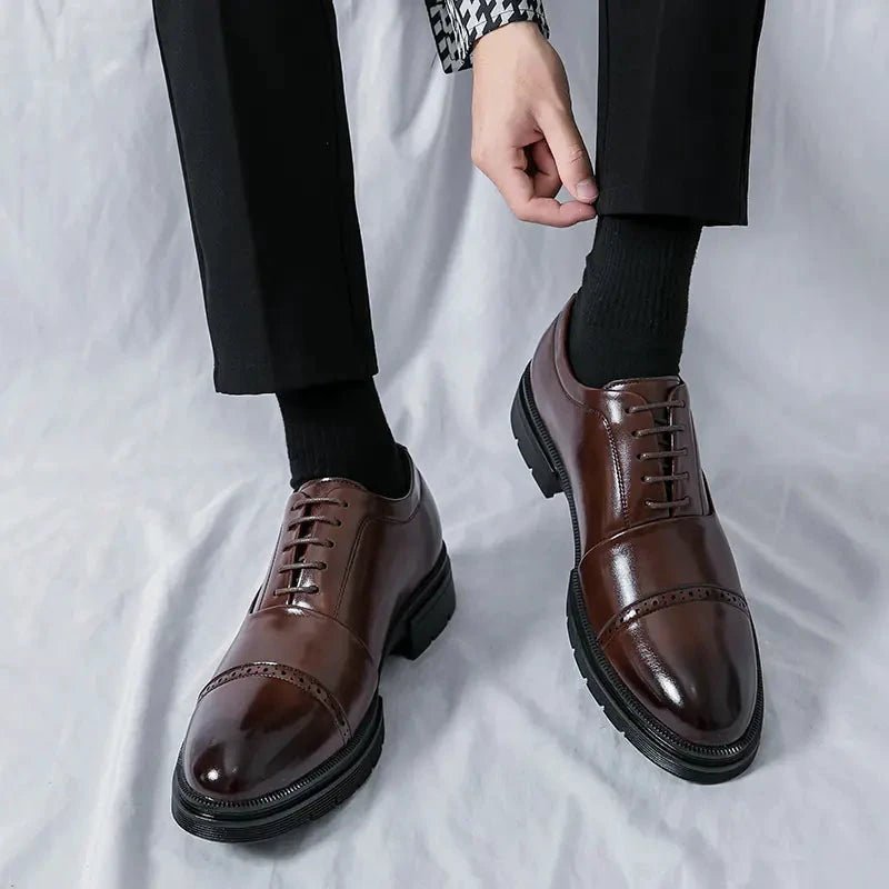 Men's elegant breathable tassel loafers by MANDOTOS, showcasing stylish leather design with tassel details and comfortable fit.