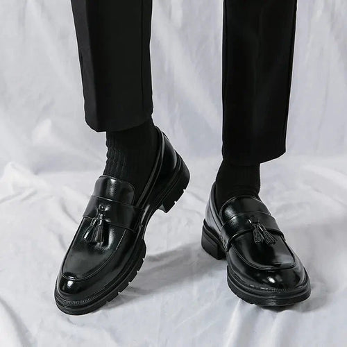 Men's elegant breathable tassel loafers by MANDOTOS, featuring sleek design and comfortable fit for stylish casual wear.