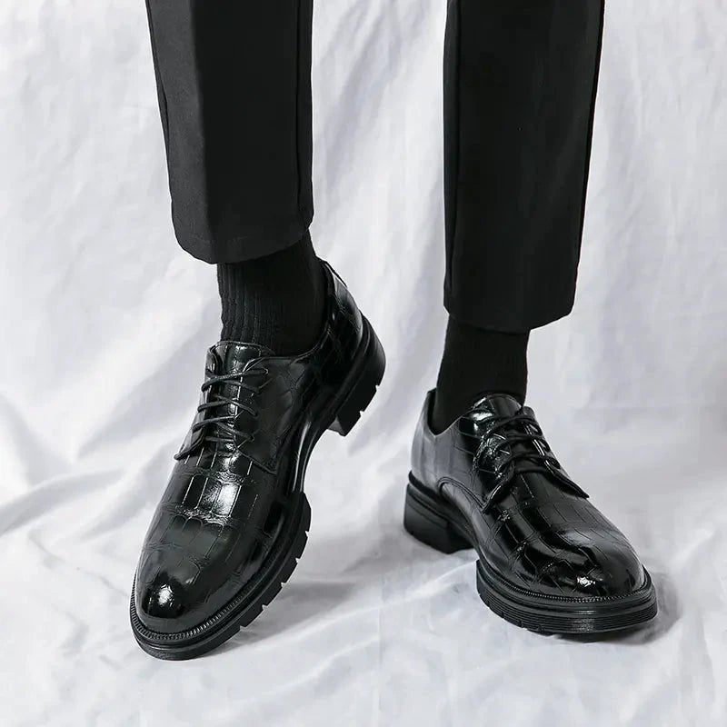 Men's elegant breathable tassel loafers by MANDOTOS, featuring sleek design and soft leather material.