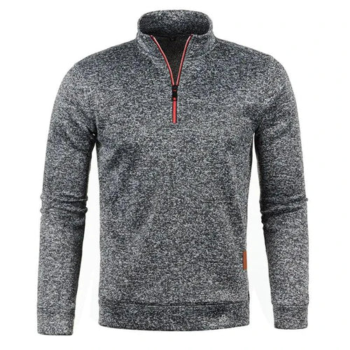 Men's half zipper turtleneck sweatshirt by MANDOTOS, cozy and stylish for fall, shown in a close-up of the dark-colored fabric and zipper.