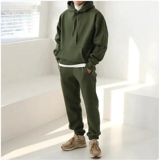 Men's hooded sports sweatshirt by MANDOTOS, showing a comfortable gray sweatshirt with front pockets and a drawstring hood.