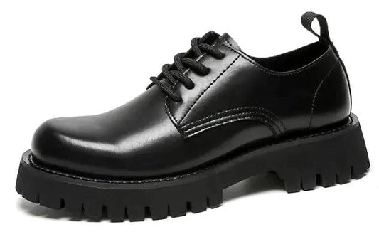 Men's leather Martin shoes by MANDOTOS with a thick cushioned sole, stylish design, and durable construction.