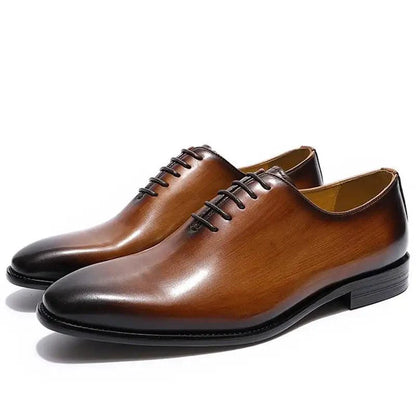 Men's leather Oxford shoes by MANDOTOS, stylish black dress shoes with polished finish and classic lace-up design.