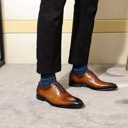 Men's brown leather Oxford shoes by MANDOTOS, featuring sleek design and polished finish for formal occasions.