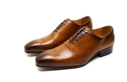 Men's leather Oxford shoes by MANDOTOS, featuring polished finish and classic design, perfect for formal or business attire.