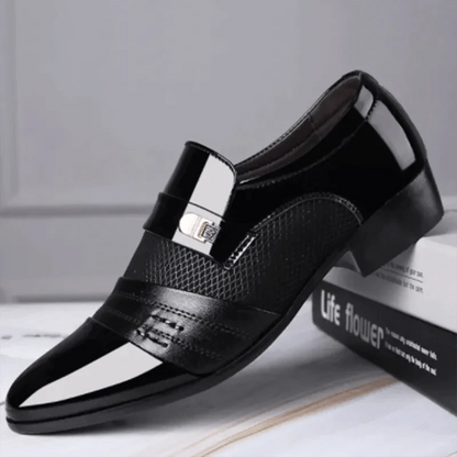 Men's luxury leather loafers by MANDOTOS featuring sleek design and polished finish, perfect for formal or casual wear.