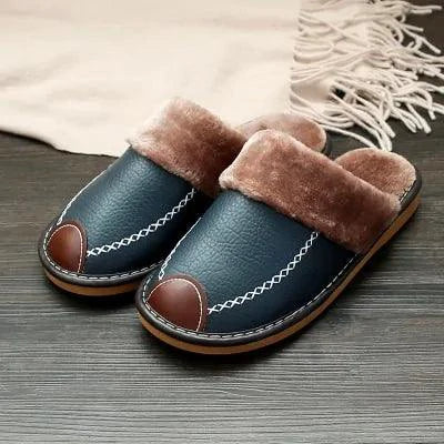 Men's luxury leather slippers by MANDOTOS featuring soft leather upper and comfortable slip-on design.