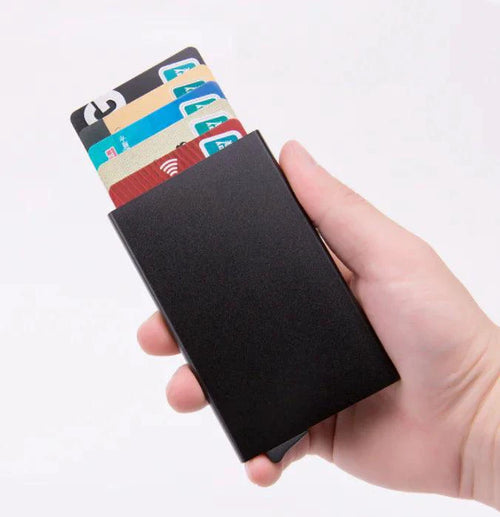 Men's RFID slim carbon fiber money clip and card holder by MANDOTOS, showcasing sleek design and secure card storage.