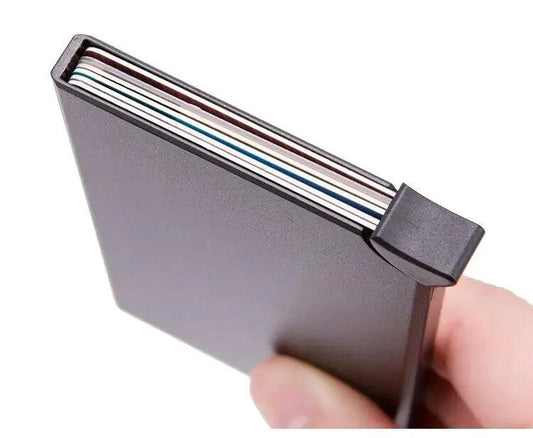 Men's RFID slim carbon fiber money clip and card holder by MANDOTOS, compact and lightweight for secure cash and card storage.