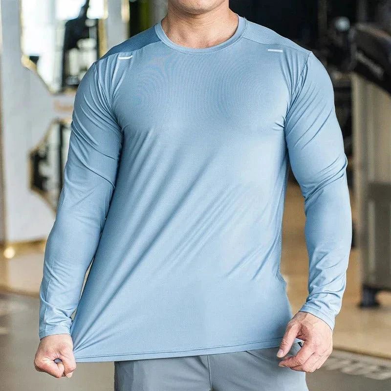 Mandotos men's long sleeve sports fitness shirt with quick-dry fabric, suitable for badminton, running, and casual bodybuilding activities.