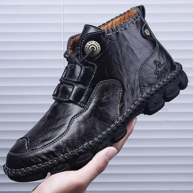 Men's stylish ankle boots by MANDOTOS featuring sleek leather design and modern silhouette, perfect for casual or smart outfits.