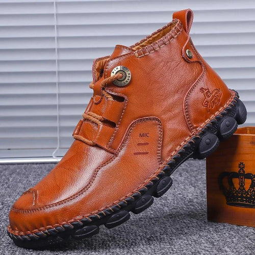 Men's stylish ankle boots by MANDOTOS featuring leather upper, lace-up design, and sleek modern look.