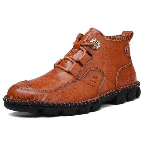 Men's stylish ankle boots by MANDOTOS featuring sleek leather design and modern silhouette, perfect for casual and dressy outfits.