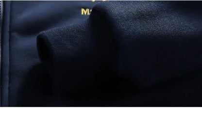 Mandotos men's winter sports set featuring a stylish, warm 2-piece outdoor adventure ensemble with jacket and pants.