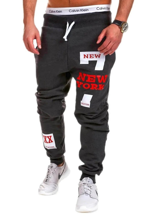 Mandotos men's joggers in black, featuring a relaxed fit with elastic waistband and cuffed ankles for comfortable casual wear.