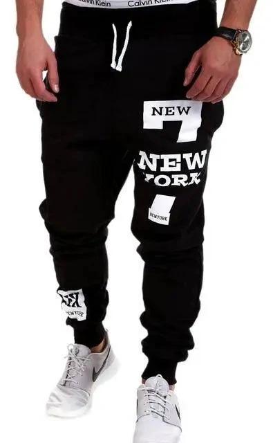 Mandotos men's joggers in black, featuring a relaxed fit, elastic waistband, and side pockets for casual comfort.