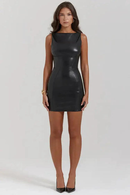 Mini leather black dress by MANDOTOS, featuring a fitted silhouette and stylish design, shown on a model.