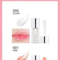 Mandotos moisturizing lip balm oil and plumping exfoliating lip gloss with a sleek tube and glossy finish.