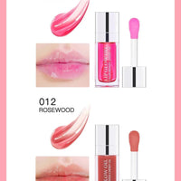 Mandotos moisturizing lip balm oil with plumping and exfoliating lip gloss, featuring a smooth, glossy finish on lips.