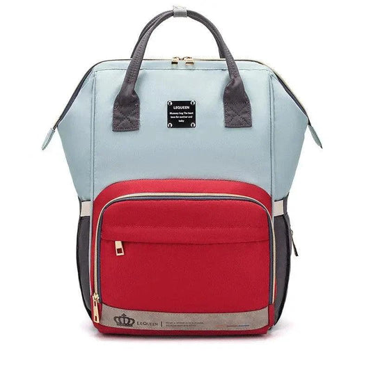 Mandotos Mummy Maternity Bag with multiple compartments, stylish design, and adjustable straps for new moms.