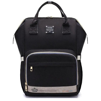 Mandotos Mummy Maternity Bag with multiple compartments, beige fabric, and sturdy handles for stylish pregnancy and postpartum use.