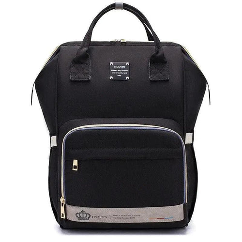 Mandotos Mummy Maternity Bag with multiple compartments, beige fabric, and sturdy handles for stylish pregnancy and postpartum use.