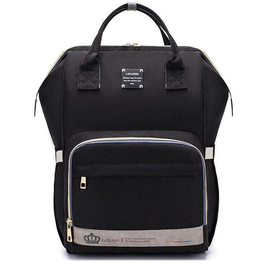 Mandotos Mummy Maternity Bag with multiple compartments, beige fabric, and sturdy handles for stylish pregnancy and postpartum use.