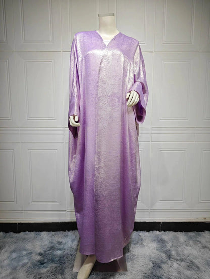 Mandotos Muslim robe abaya in black fabric with elegant flowy design, traditional Islamic fashion for women.