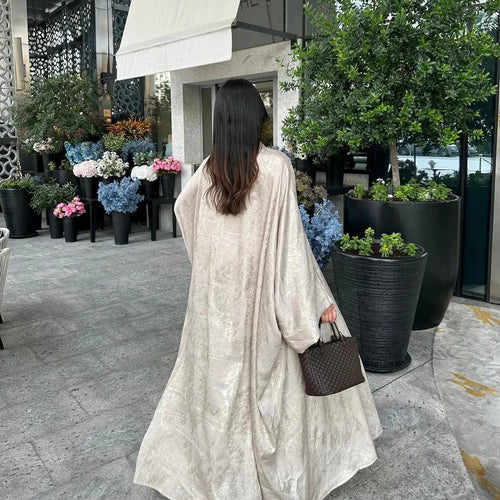 Mandotos Muslim robe abaya in black with flowing fabric and elegant design, suitable for modest Islamic attire.